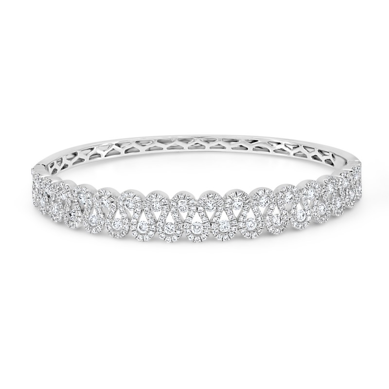 An image of a elegant concertina style diamond bangle, featuring sparkling diamonds arranged in a concertina style on a sleek bangle